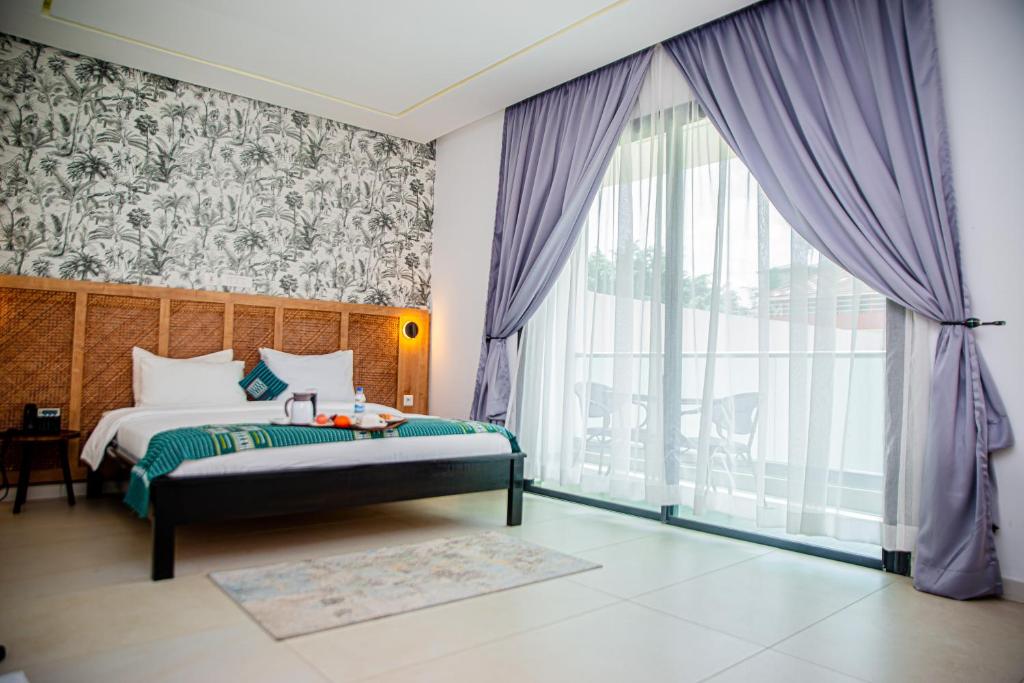 Image de Hotel Yatchenin Abidjan, Côte d'Ivoire, Cocody, 2plateaux Vallon